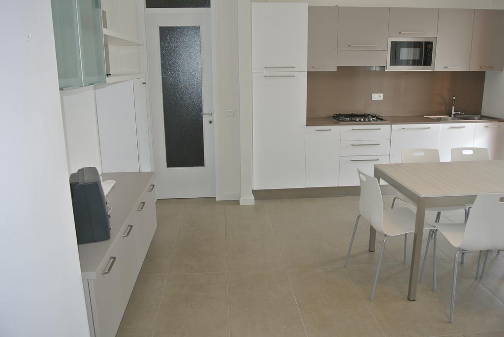Residence Gardenia Lignano Sabbiadoro Bagian luar foto